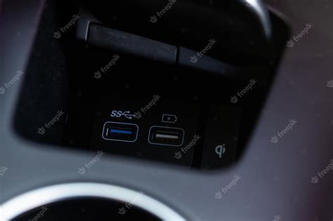 Premium Photo | Opened car usb port in the car for connecting device ...