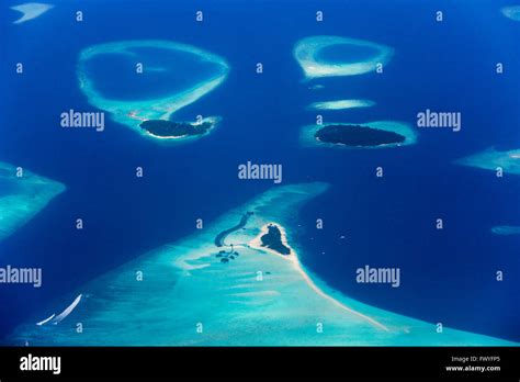 Aerial view of atolls in the ocean, Maldives Stock Photo - Alamy