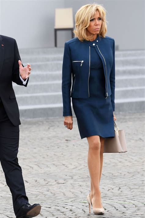 Brigitte Macron looks flawless in a navy jacket and dress by Louis ...