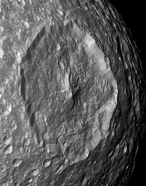 natural satellites - Why is there a mountain inside the Herschel crater ...