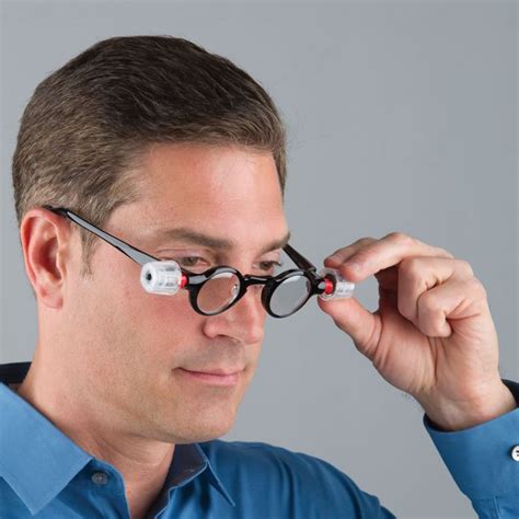 The Only Adjustable Focus Reading Glasses - Hammacher Schlemmer ...