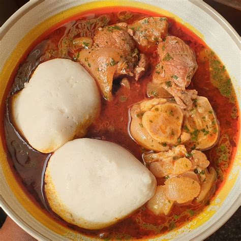 Okros soup, banku, beef and pig feet - A Sumptuous African Meal