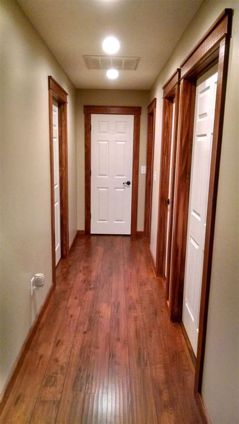 White painted doors with stained wood trim.... Rustic cozy look for ...