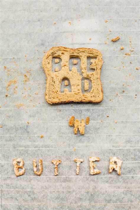 "Slice Of Bread With Letters Cut Out Of It And Butter Written With ...