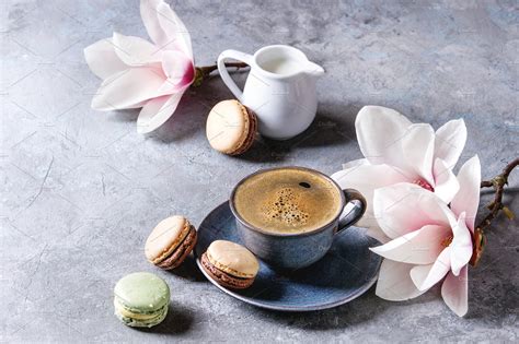 Coffee with spring flowers containing coffee, flowers, and flower ...