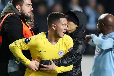 Chelsea star Eden Hazard grabbed by pitch invader before handing over ...