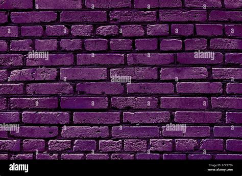 Purple brick wall texture background Stock Photo - Alamy