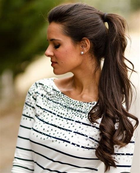 10 Curly Hair Ponytails to Change Up Your Look | StyleCaster