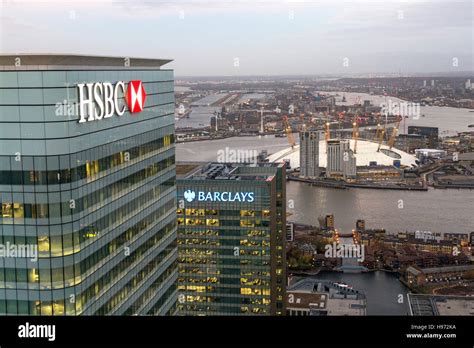 HSBC and Barclays Bank headquarters at Canary Wharf in London. The O2 ...