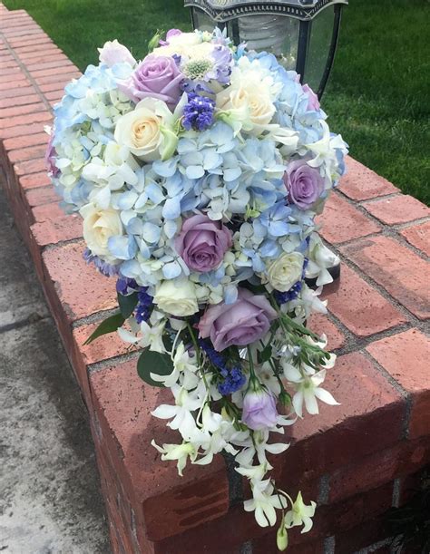 blue hydrangea and white roses cascading bouquet | Blue wedding bouquet ...