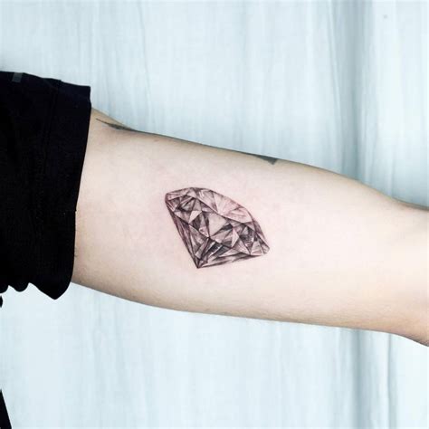 Diamond tattoo done on the inner arm, micro-realistic