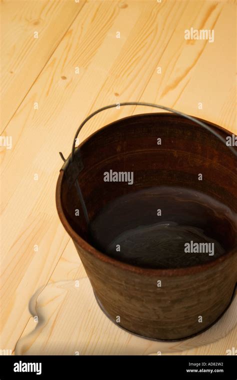 Bucket of water Stock Photo - Alamy