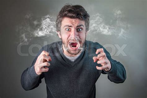 Furious man steaming with rage | Stock image | Colourbox