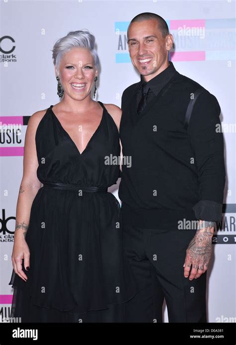 Singer Pink, real name Alecia Moore and husband Carey Hart 2010 ...