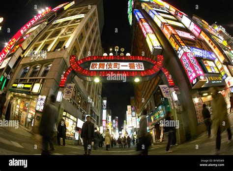 Crowd in Street at Night Stock Photo - Alamy