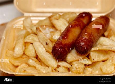 two sausages and chips a sausage supper from a british takeaway Stock ...