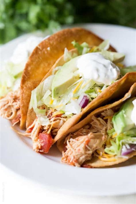 Slow Cooker Mexican Shredded Chicken Tacos - Tastes Lovely