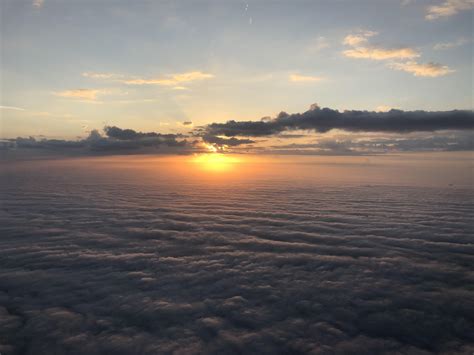 A sunrise over a sea of clouds, (OC). : BeAmazed