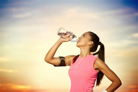 sporty girl drinking water – The World of Hayleys