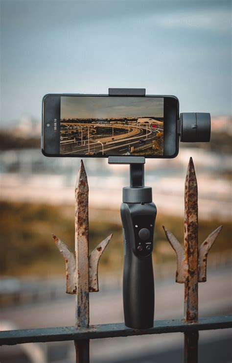 Close-Up Photo of a Person Recording a Live Performance with Her Cell ...