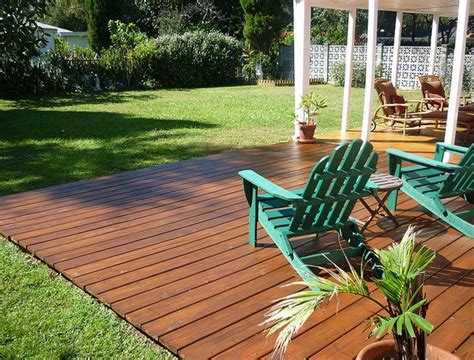 flush ground level deck | Decks backyard, Wooden deck designs, Backyard ...