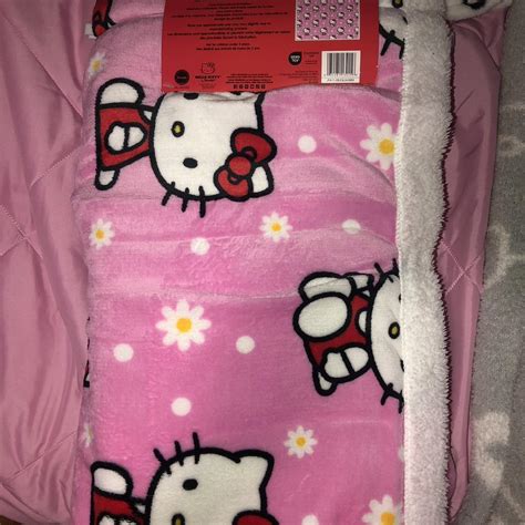 Hello kitty pink daisy blanket Brand new! Ships... - Depop