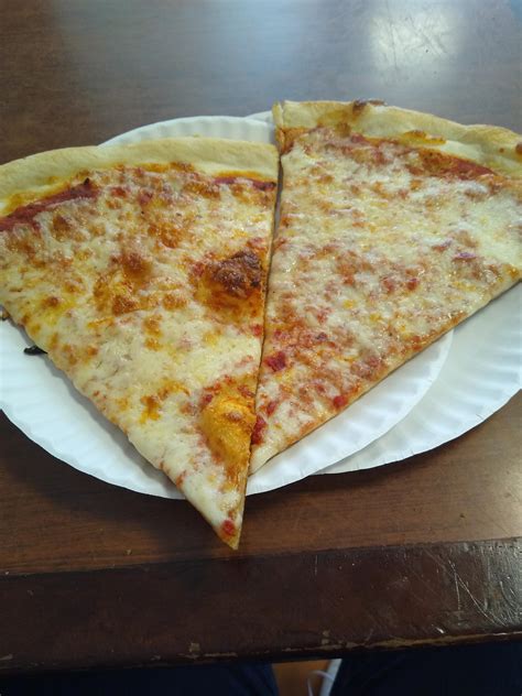 Calorie estimation for me, please? 2 slices of plain cheese NY pizza ...