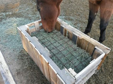 Slow Hay Feeder. Made from 2 pellet crates. Easy and saves the hay ...