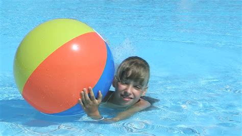 Child Playing Beach Ball In Swimming Pool. Stock Footage Video 4254929 ...