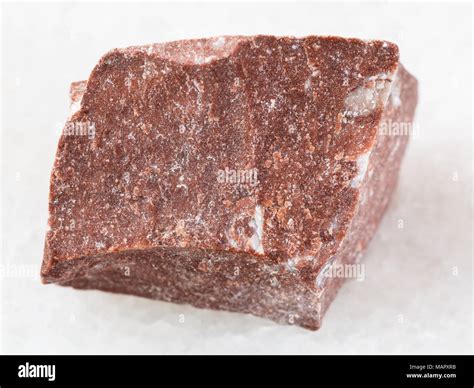 macro shooting of natural mineral rock specimen - piece of rough red ...