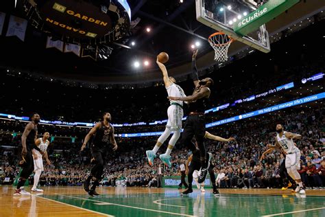 Download Jayson Tatum White Jersey Mid-Air Wallpaper | Wallpapers.com