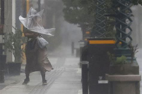 Powerful typhoon pounds southern Japan; thousands evacuated | AP News