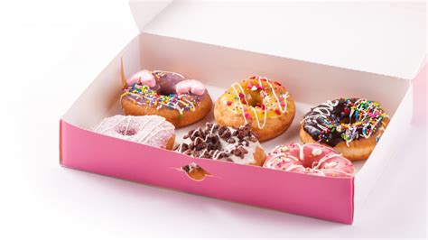 The Real Reason So Many Donuts Come In Pink Boxes