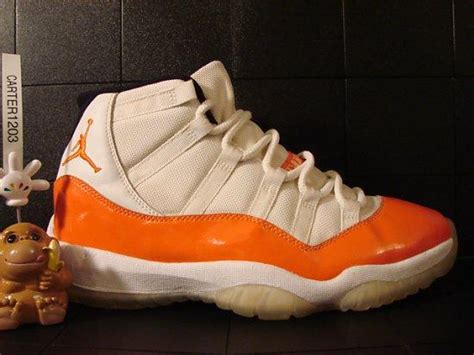 Air Jordan XI (11) - White/ Orange Sample- SneakerFiles