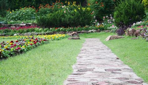 Stone pathway in a garden during the day 1989200 Stock Photo at Vecteezy