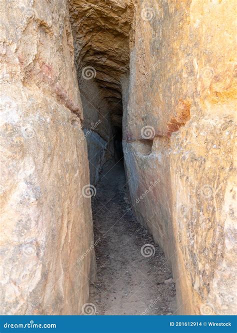 Shot of an old cave tunnel stock photo. Image of cave - 201612914