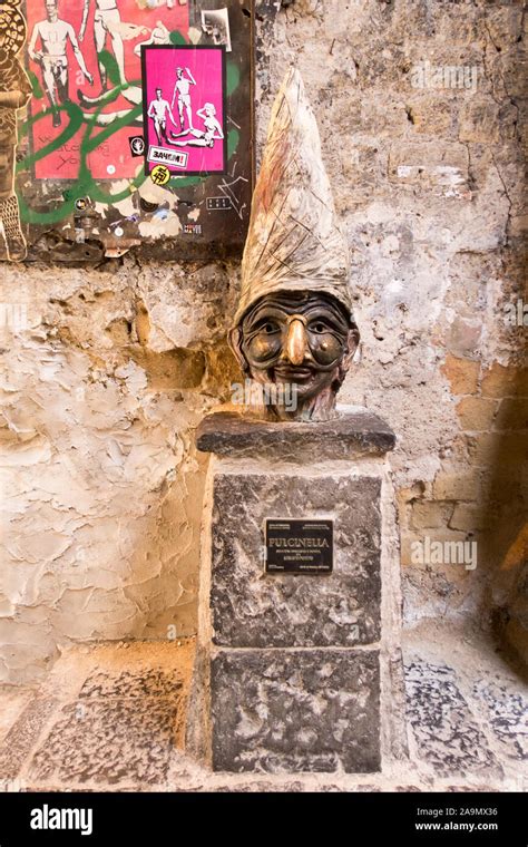 A statue of Pulcinella in Via dei Tribunali in Naples city center Stock ...