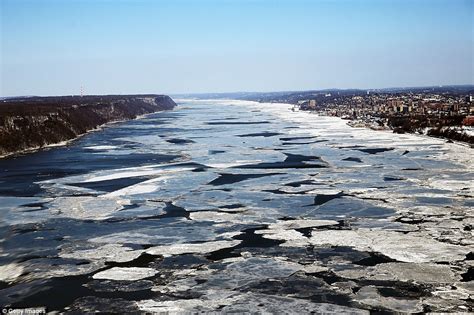 Manhattan on ice: Stunning aerial photos show the magical effects of ...