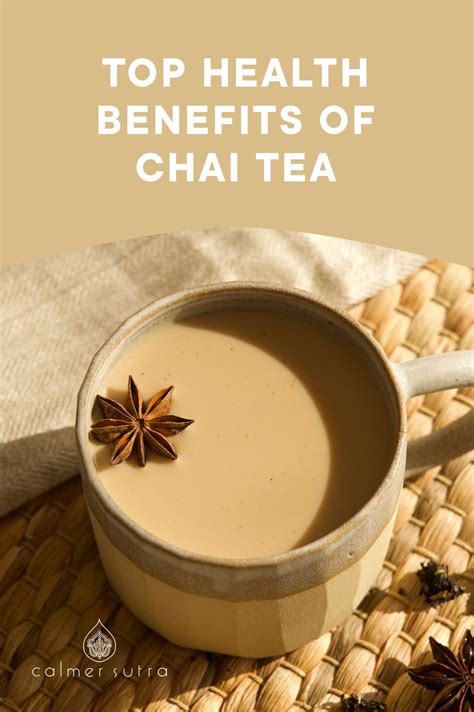 Ceramic cup of a chai latte sitting on rattan placemat. Tea Benefits ...