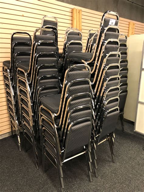 APPROX. 60 STACKING GREY PATTERNED CONFERENCE CHAIRS