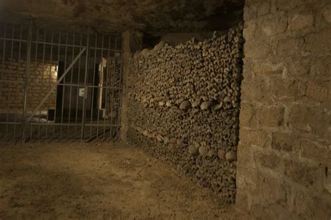 Paris Catacombs Skulls and bones — Stock Photo © izanbar #79494124