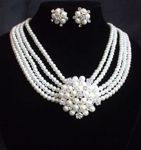 Account Suspended | Beautiful pearl necklace, Pearl necklace designs ...