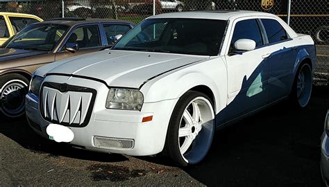 White Grandma car, what big teeth you have. : r/Shitty_Car_Mods