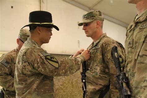 Train, Advise, Assist Command - South conducts battlefield promotions ...