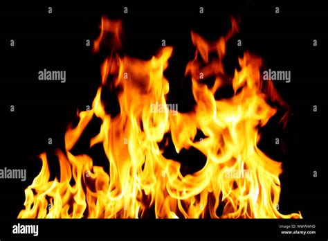 inferno flame fire on black background close up Stock Photo - Alamy