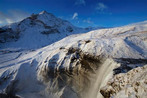 Skogafoss Waterfall in the Winter, Iceland Stock Image - Image of ...