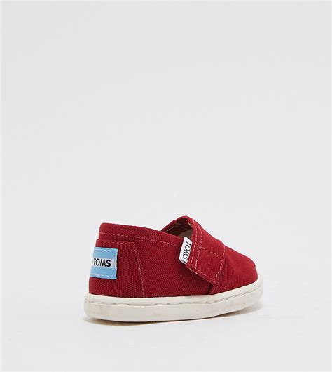 Buy Toms Original Classics Slip Ons In Red | 6thStreet UAE