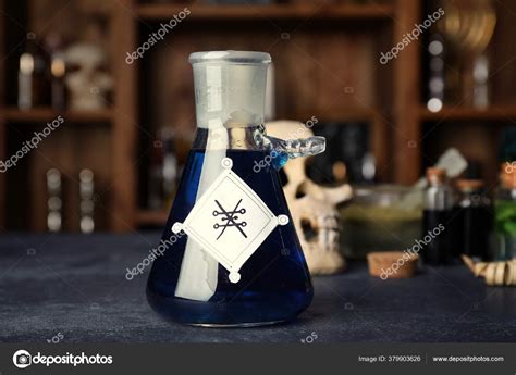 Bottle Potion Alchemist's Table Stock Photo by ©serezniy 379903626