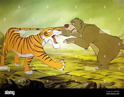 THE JUNGLE BOOK, from left, Shere Khan the Tiger (voiced by George ...