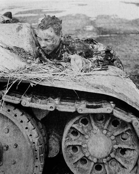 Charred remains of a Soviet tank crewman somewhere on the Eastern Front ...